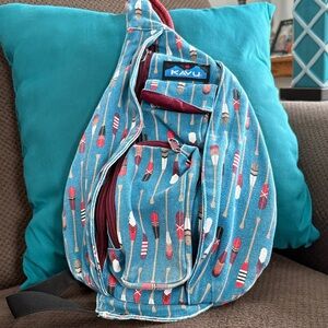 Kavu Teal Paddle-Print Sling Pack with Red Accents